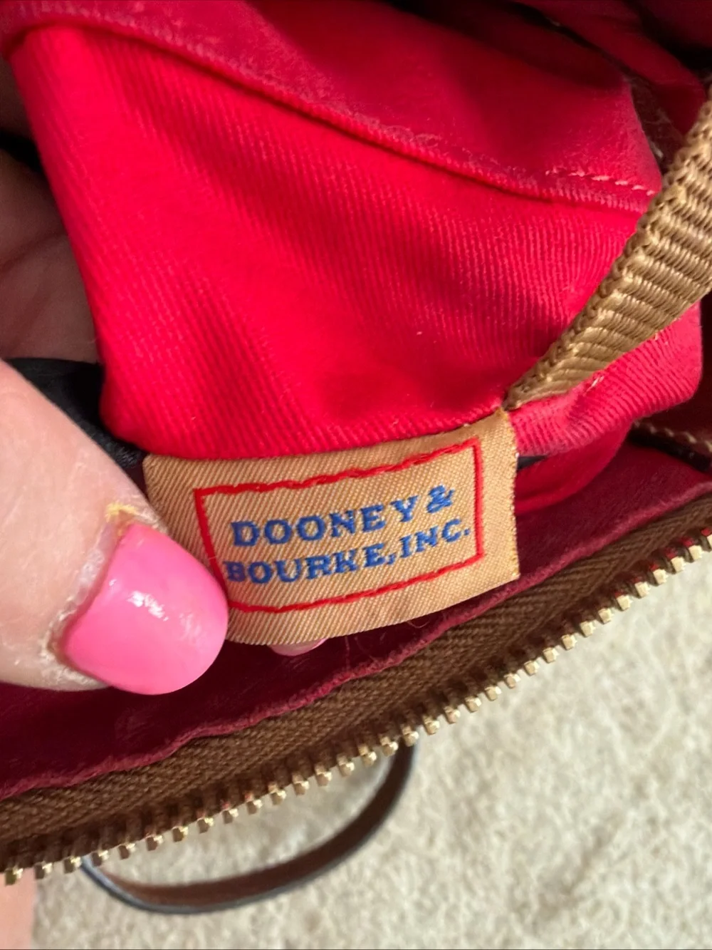 Dooney & Bourke Black Pebbled Leather Crossbody Bag with Brown Trim